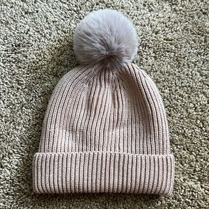 Kids beanie with fuzzy ball at top